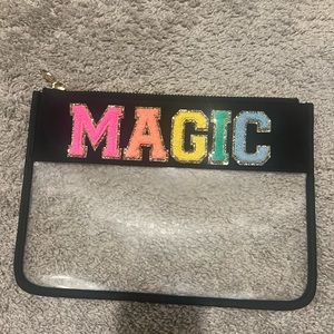 black flat stoney clover pouch